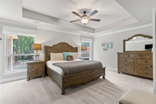 301 Prairie Oak Ct, Burleson, TX 76028 - carpeted bedroom with a tray ceiling, crown molding, and a ceiling fan