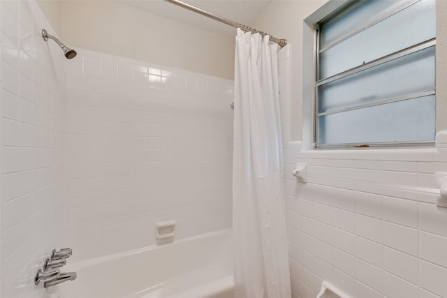 5504 Whitman Ave, Fort Worth, TX 76133 - bathroom with shower / bath combo with shower curtain and tile walls