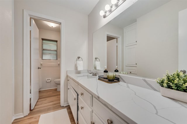 5504 Whitman Ave, Fort Worth, TX 76133 - bathroom featuring wood finished floors and vanity