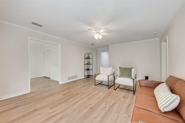 5504 Whitman Ave, Fort Worth, TX 76133 - living area with crown molding, a ceiling fan, and light wood finished floors