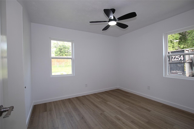 1825 Grove Cir, Mesquite, TX 75149 - unfurnished room featuring wood finished floors and ceiling fan