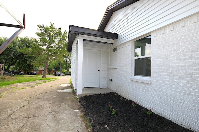 1825 Grove Cir, Mesquite, TX 75149 - doorway to property with brick siding