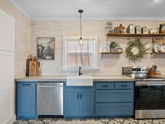 309 E 3rd St, Maypearl, TX 76064 - kitchen with stainless steel appliances, blue cabinets, open shelves, light countertops, and ornamental molding