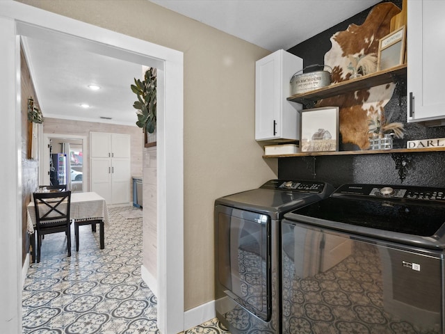 309 E 3rd St, Maypearl, TX 76064 - laundry room with washing machine and clothes dryer and cabinet space
