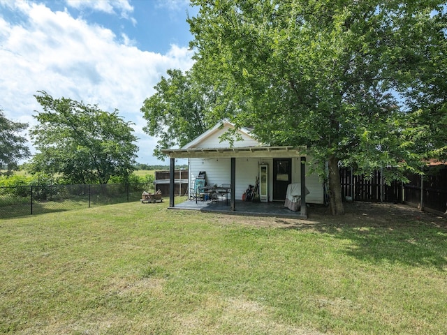 309 E 3rd St, Maypearl, TX 76064 - fenced backyard featuring a patio area