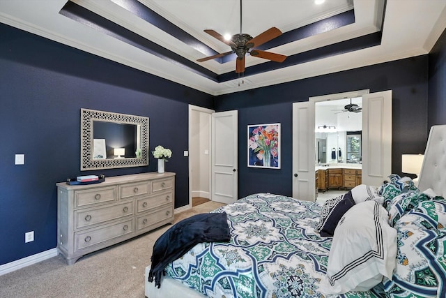 6617 Whittier Ln, Colleyville, TX 76034 - bedroom featuring a tray ceiling, ornamental molding, light carpet, connected bathroom, and ceiling fan