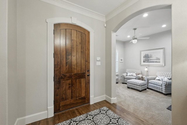 6617 Whittier Ln, Colleyville, TX 76034 - foyer entrance featuring arched walkways, a ceiling fan, wood finished floors, crown molding, and recessed lighting