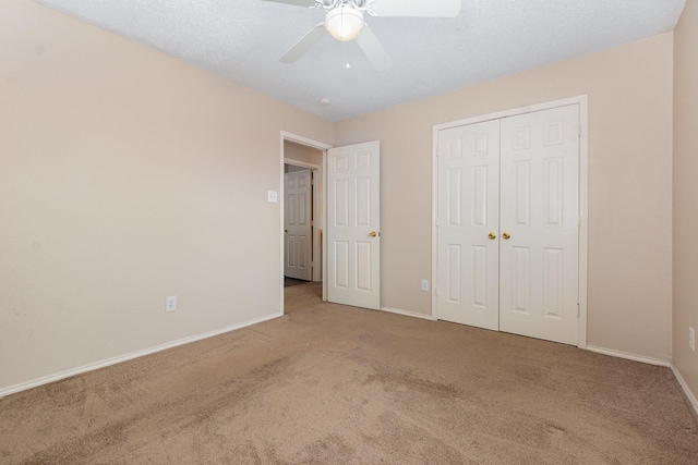 2120 Valley Falls Ave, Mesquite, TX 75181 - unfurnished bedroom featuring carpet flooring, a closet, and ceiling fan