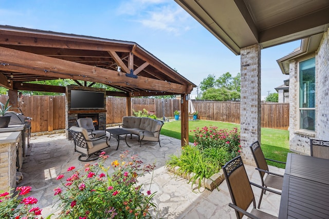 9424 Excursion Dr, Oak Point, TX 75068 - fenced backyard with a patio, an outdoor living space, a gazebo, and a grill