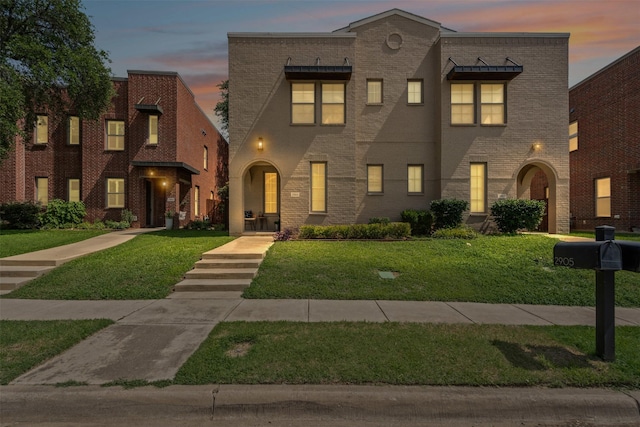 2905 Merrimac St, Fort Worth, TX 76107 - view of front of home with a lawn and brick siding