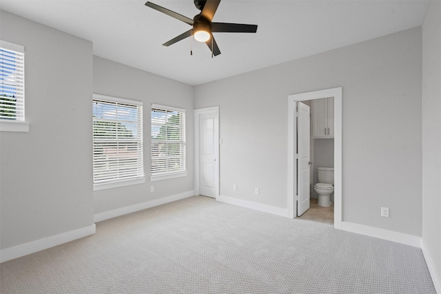 2905 Merrimac St, Fort Worth, TX 76107 - unfurnished bedroom with light carpet, ensuite bathroom, and ceiling fan