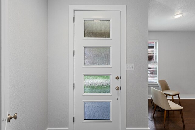 2905 Merrimac St, Fort Worth, TX 76107 - entryway featuring wood finished floors and baseboards