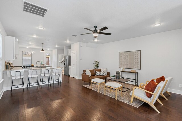 2905 Merrimac St, Fort Worth, TX 76107 - living area featuring a ceiling fan, dark wood finished floors, and recessed lighting