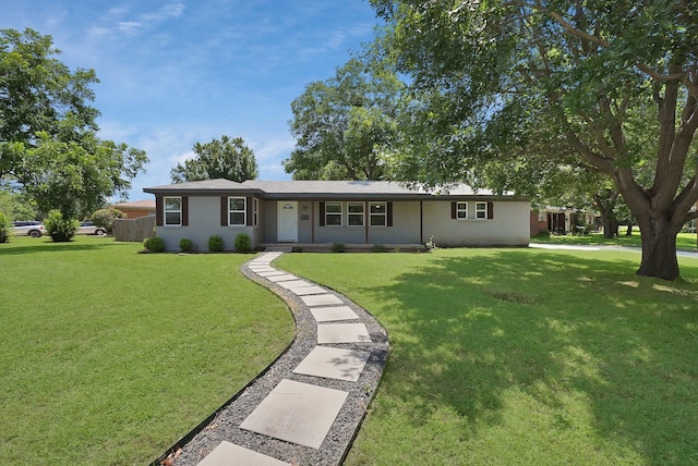 3767 Matson St, North Richland Hills, TX 76117 - ranch-style house with a front lawn and brick siding