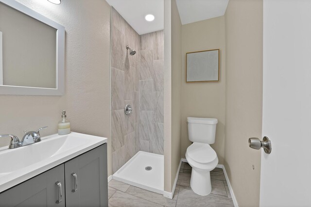 3767 Matson St, North Richland Hills, TX 76117 - full bath with vanity, a tile shower, and marble look tile flooring