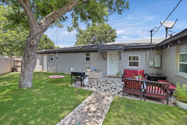 3767 Matson St, North Richland Hills, TX 76117 - rear view of property featuring an outdoor hangout area, a patio area, brick siding, and a shingled roof