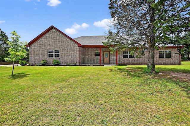187 Brandon Way, Pottsboro, TX 75076 - view of front of house with brick siding and a front lawn