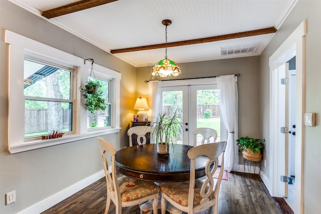2324 Lynnhaven Rd, Fort Worth, TX 76103 - dining area with french doors, healthy amount of natural light, dark wood finished floors, and crown molding