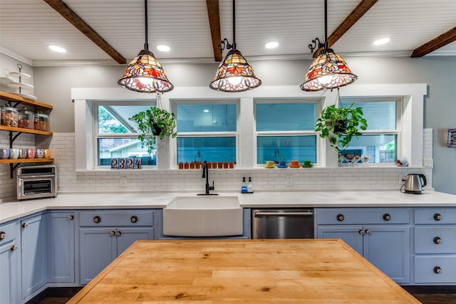 2324 Lynnhaven Rd, Fort Worth, TX 76103 - kitchen with stainless steel dishwasher, beam ceiling, decorative backsplash, pendant lighting, and recessed lighting