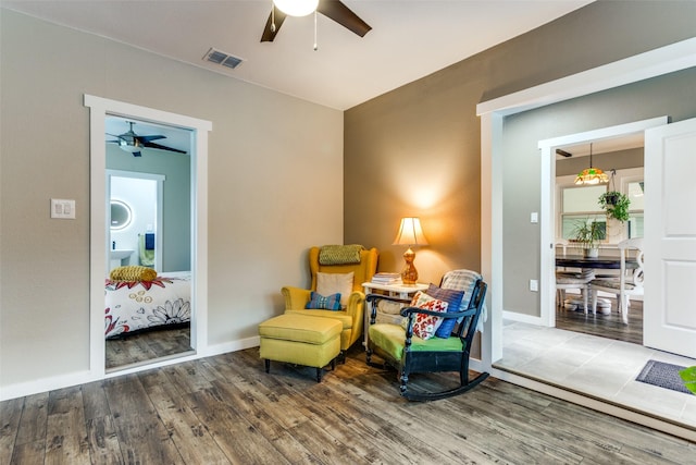 2324 Lynnhaven Rd, Fort Worth, TX 76103 - sitting room featuring a ceiling fan and wood finished floors