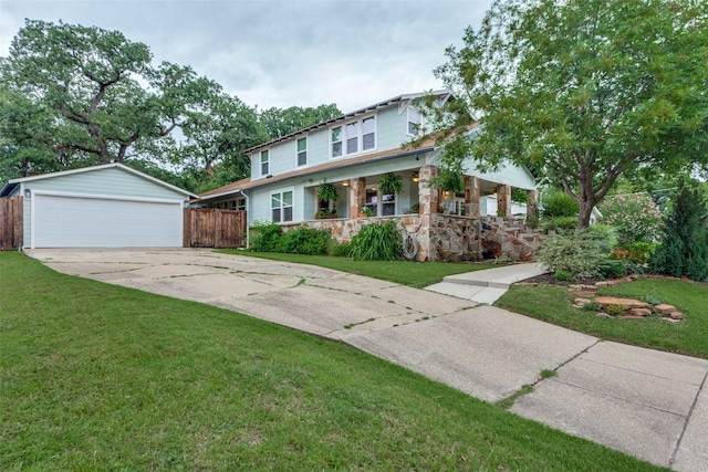 2324 Lynnhaven Rd, Fort Worth, TX 76103 - view of front of home with a porch, a garage, and stone siding