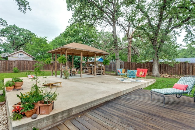 2324 Lynnhaven Rd, Fort Worth, TX 76103 - wooden terrace featuring a gazebo, a fenced backyard, outdoor dining space, and a patio