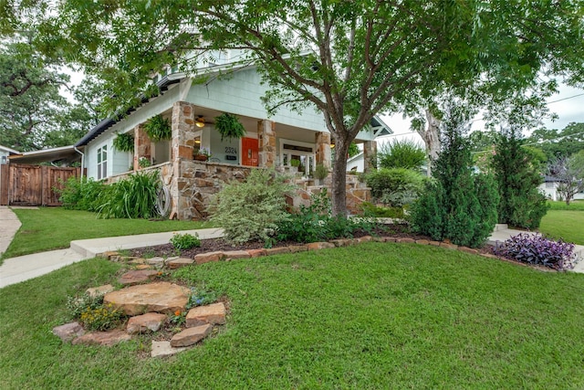 2324 Lynnhaven Rd, Fort Worth, TX 76103 - view of front of home with stone siding and a porch