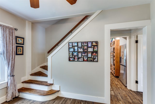 2324 Lynnhaven Rd, Fort Worth, TX 76103 - stairs featuring a ceiling fan and wood finished floors