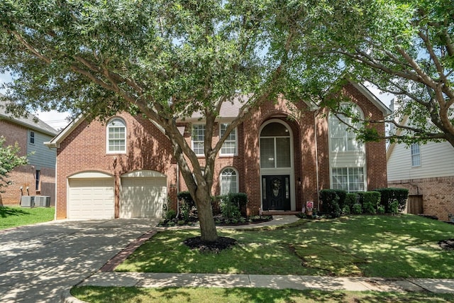 1092 Rosewood Dr, Grapevine, TX 76051 - view of front of property featuring brick siding, concrete driveway, a front lawn, and a garage