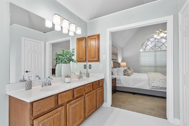 1092 Rosewood Dr, Grapevine, TX 76051 - full bathroom featuring connected bathroom, double vanity, ceiling fan, and lofted ceiling