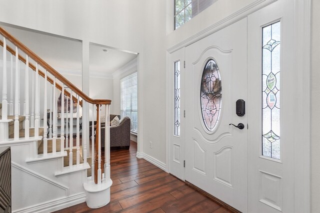 1092 Rosewood Dr, Grapevine, TX 76051 - entryway with stairway, wood finished floors, a high ceiling, and crown molding