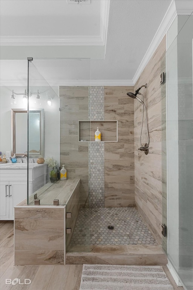 107 Preston Ave, Shreveport, LA 71105 - full bathroom featuring crown molding, a shower stall, vanity, and wood finished floors