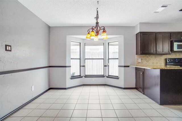 7440 Meadowview Ter, North Richland Hills, TX 76182 - unfurnished dining area featuring a chandelier and a textured ceiling