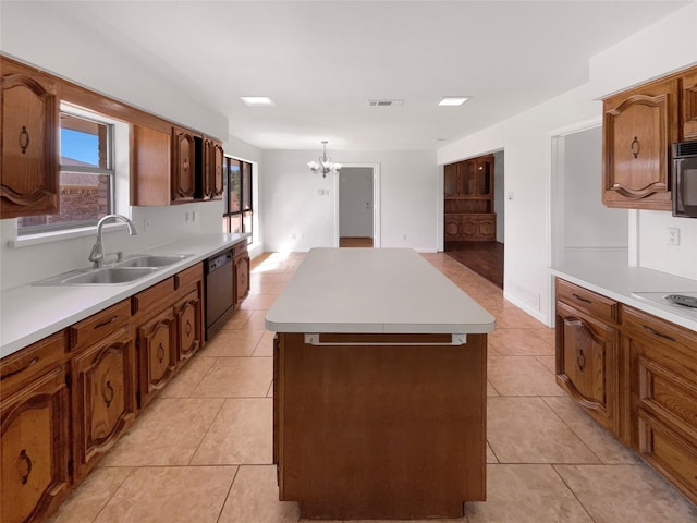 1846 Green Tree Ln, Duncanville, TX 75137 - kitchen featuring a center island, a chandelier, dishwasher, light countertops, and light tile patterned floors
