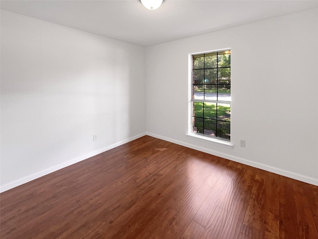 1846 Green Tree Ln, Duncanville, TX 75137 - spare room with dark wood-style flooring and baseboards