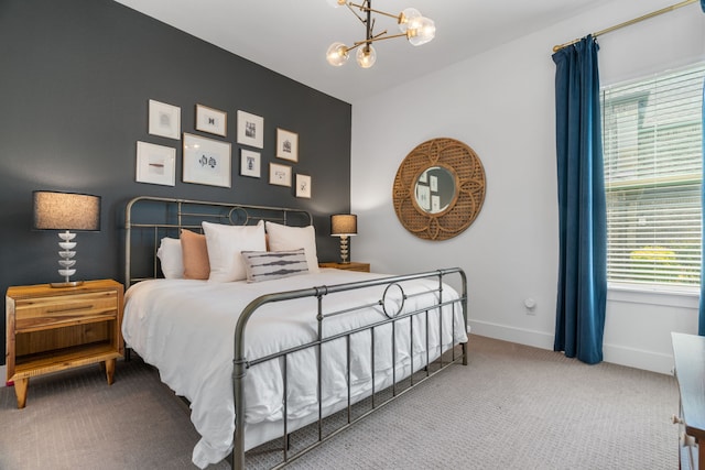 403 Trigger Trl, Argyle, TX 76226 - carpeted bedroom with a chandelier and baseboards
