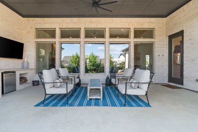 403 Trigger Trl, Argyle, TX 76226 - view of patio with an outdoor living space with a fireplace