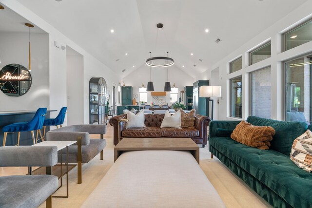403 Trigger Trl, Argyle, TX 76226 - living area featuring high vaulted ceiling, arched walkways, and recessed lighting