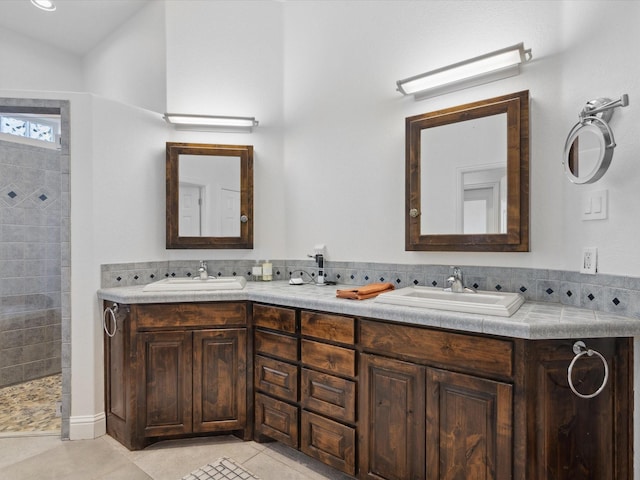 186 Deer Creek Dr, Aledo, TX 76008 - bathroom with double vanity, tile patterned floors, and tiled shower