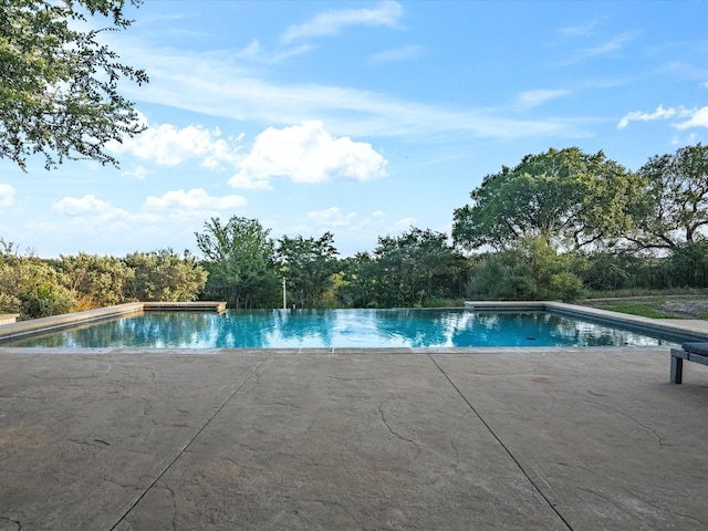 186 Deer Creek Dr, Aledo, TX 76008 - view of pool featuring an infinity pool and a patio area