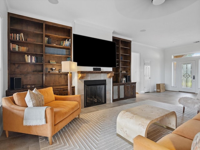186 Deer Creek Dr, Aledo, TX 76008 - living area with a tiled fireplace, ornamental molding, and built in features