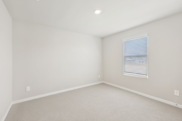 505 Willet Dr, Mckinney, TX 75069 - carpeted empty room with baseboards