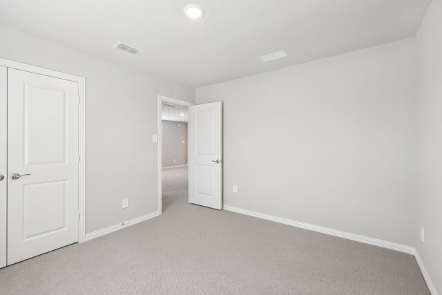 505 Willet Dr, Mckinney, TX 75069 - unfurnished bedroom with light carpet and baseboards
