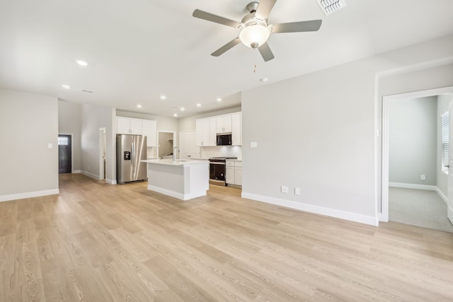 505 Willet Dr, Mckinney, TX 75069 - unfurnished living room featuring recessed lighting, light wood-style flooring, and ceiling fan