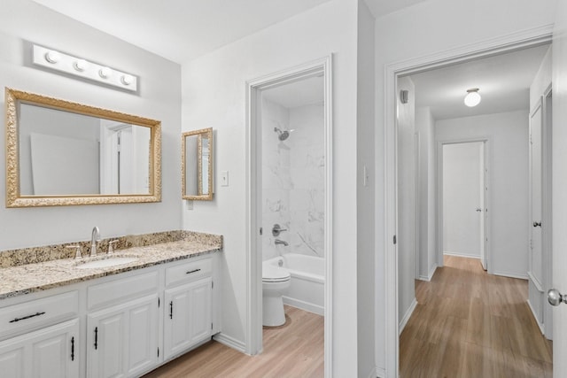 1109 Paluxy Ct, Flower Mound, TX 75028 - full bathroom featuring wood finished floors, vanity, and shower / bathtub combination