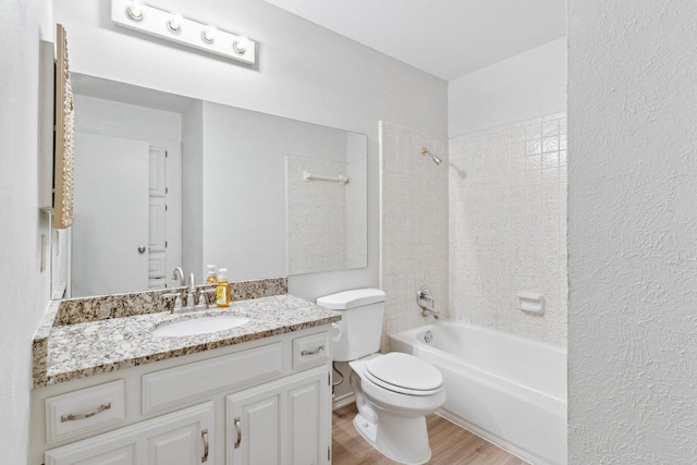 1109 Paluxy Ct, Flower Mound, TX 75028 - bathroom with wood finished floors, vanity, and shower / tub combination