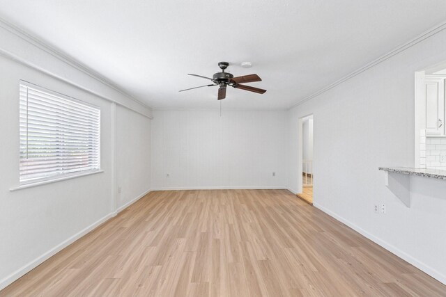 1109 Paluxy Ct, Flower Mound, TX 75028 - unfurnished room with a ceiling fan, light wood-style floors, and ornamental molding