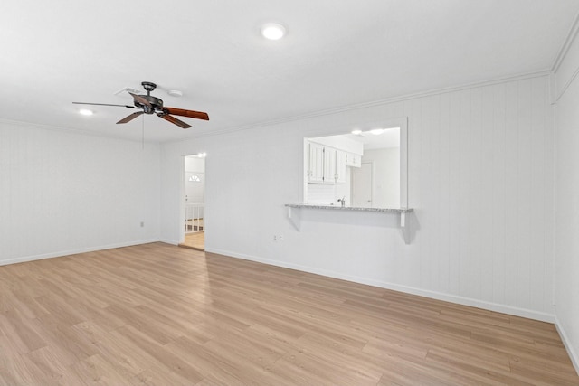1109 Paluxy Ct, Flower Mound, TX 75028 - spare room featuring ceiling fan, light wood-type flooring, and crown molding
