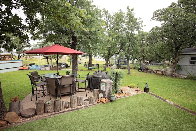 10234 County Road 198, Breckenridge, TX 76424 - view of yard featuring a patio