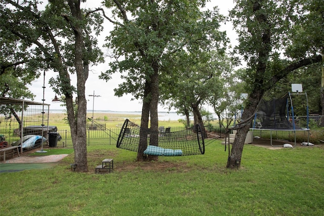 10234 County Road 198, Breckenridge, TX 76424 - view of yard featuring a trampoline